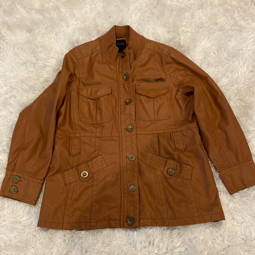 Taper fit Coat. Cognac colored. Has a zipper along with buttons.